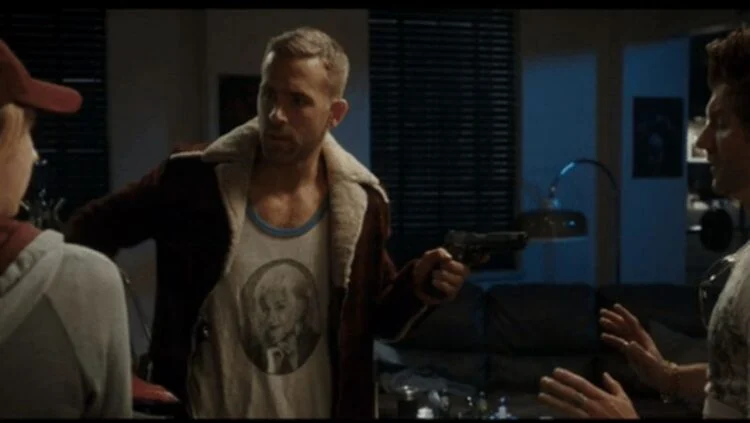 Ryan Reynolds Red Notice handshake deal featured NSFW Bea Arthur photo