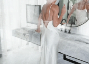Victoria Beckham stunned in an open-back satin dress