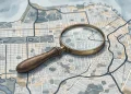 Conceptual illustration of a magnifying glass on a San Francisco map.