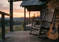 Conceptual image of a quiet porch with a guitar at sunset.