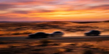 Conceptual abstract art of a desert road chase.