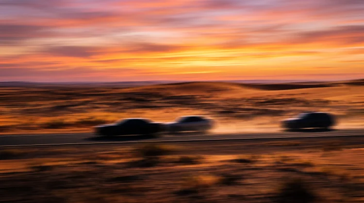 Conceptual abstract art of a desert road chase.