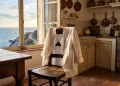 A conceptual scene of a 1970s kitchen interior near the coast.