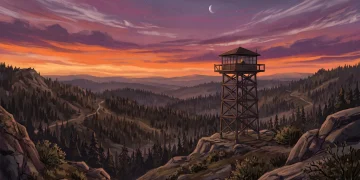 A fire lookout tower silhouette against a sunset sky over a forest.