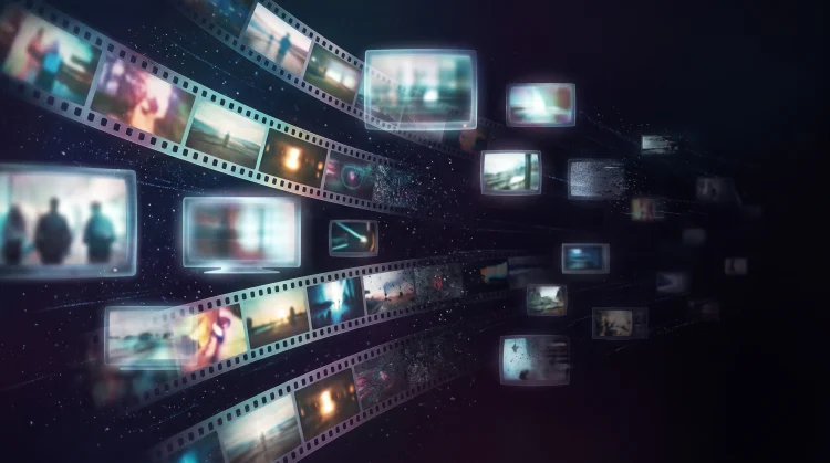 A conceptual illustration of film strips and media icons fading out to represent content leaving a streaming service.